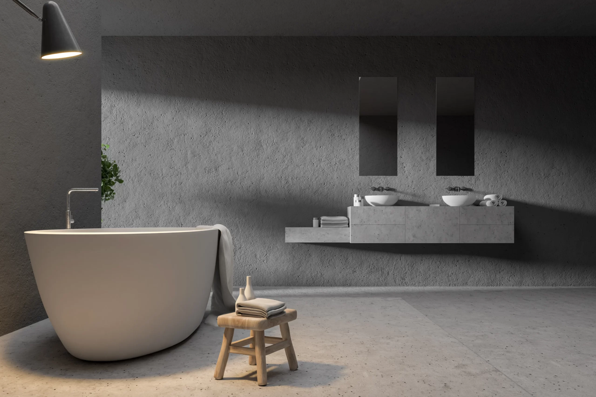 Modern minimalist bathroom featuring dark grey textured concrete walls, a freestanding white bathtub, and a floating dual vanity